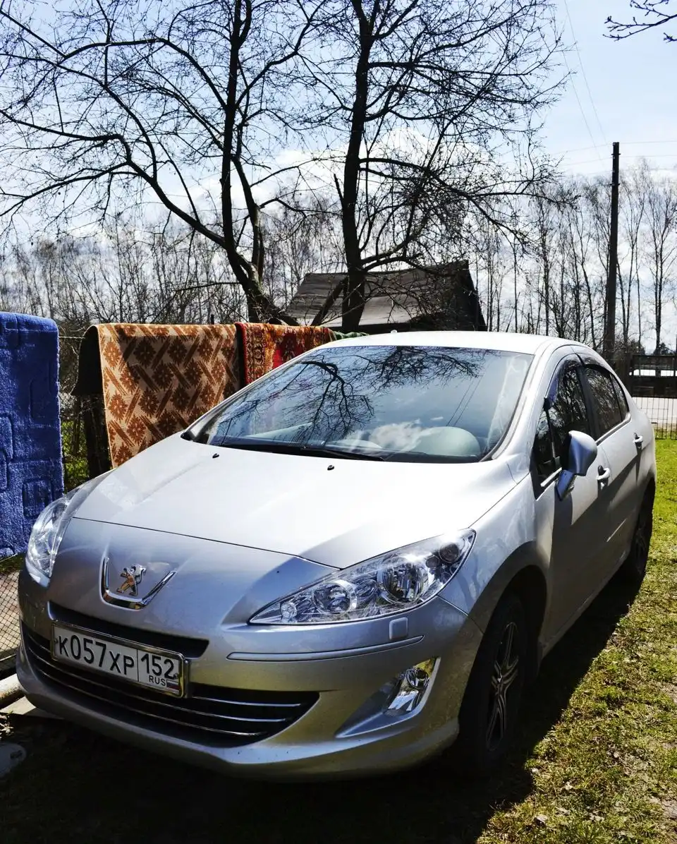 Фото автомобиля PEUGEOT 408, 2012 — госномер Т039ЕЕ797. Цвет: Серебристый