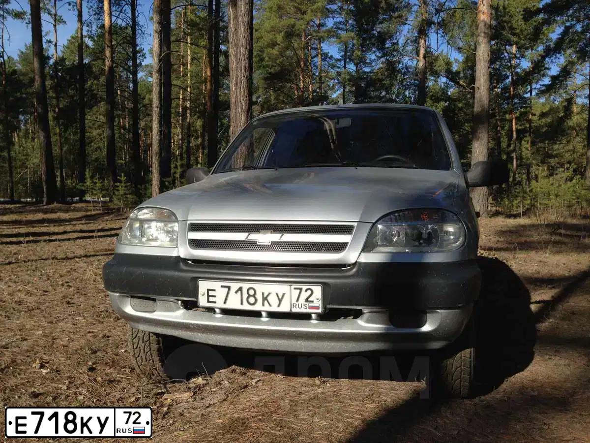 Фото автомобиля CHEVROLET NIVA, 2006 — госномер Т471ЕК55. Цвет: СВЕТЛО-СЕРЕБР.МЕТАЛЛИК