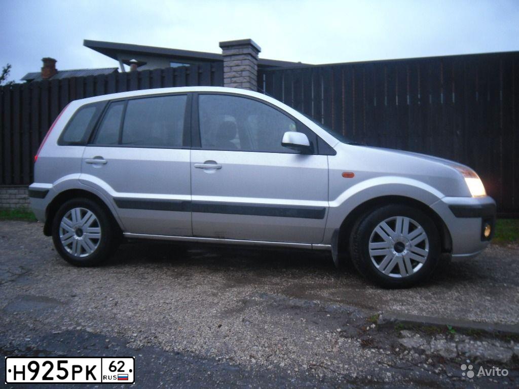 Фото автомобиля KIA RIO, 2007 — госномер Т161КТ62. Цвет: ПОЛЯРНОЕ СЕРЕБРО