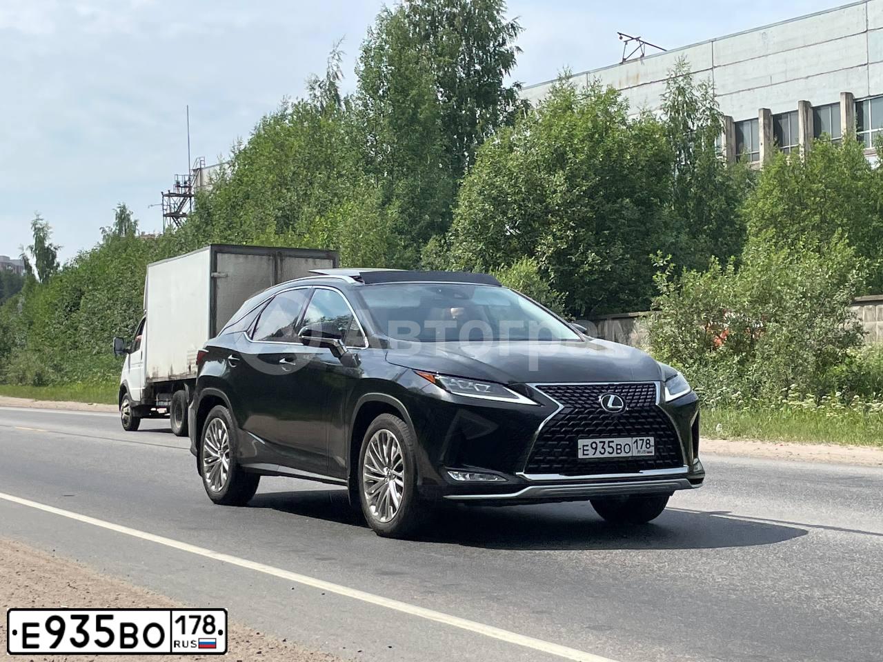 Фото автомобиля TOYOTA CAMRY, 2010 — госномер Е935ВО178. Цвет: ЧЕРНЫЙ