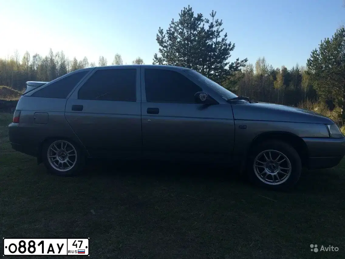 Фото автомобиля LADA 2112, 2006 — госномер Т049АМ198. Цвет: СРЕДНИЙ СЕРО-ЗЕЛЕНЫЙ МЕТАЛЛ