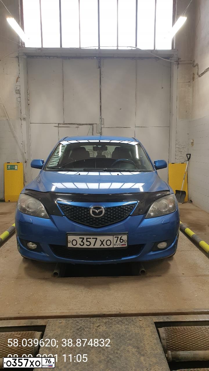 Фото автомобиля MAZDA A 3, 2005 — госномер О357ХО76. Цвет: СИНИЙ