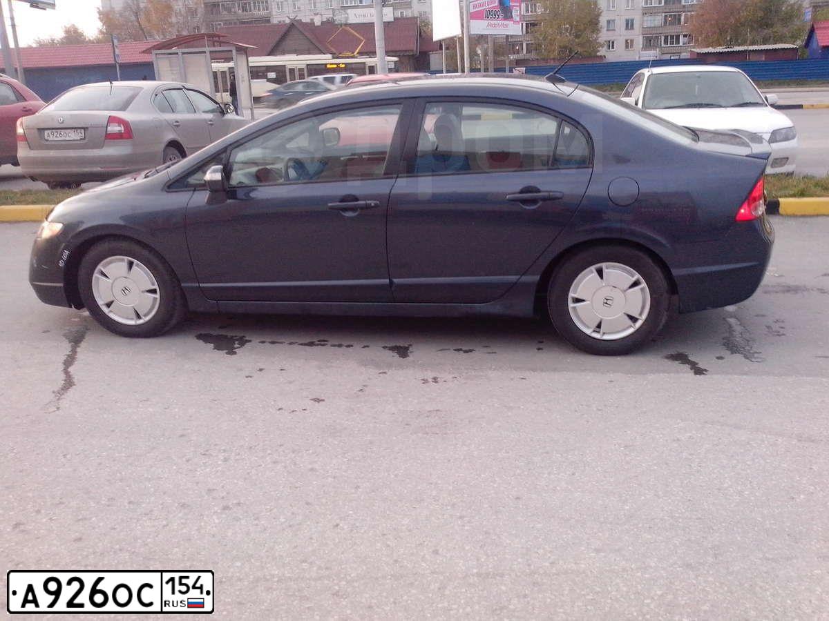 Фото автомобиля SKODA OCTAVIA, 2011 — госномер А926ОС154. Цвет: Серый
