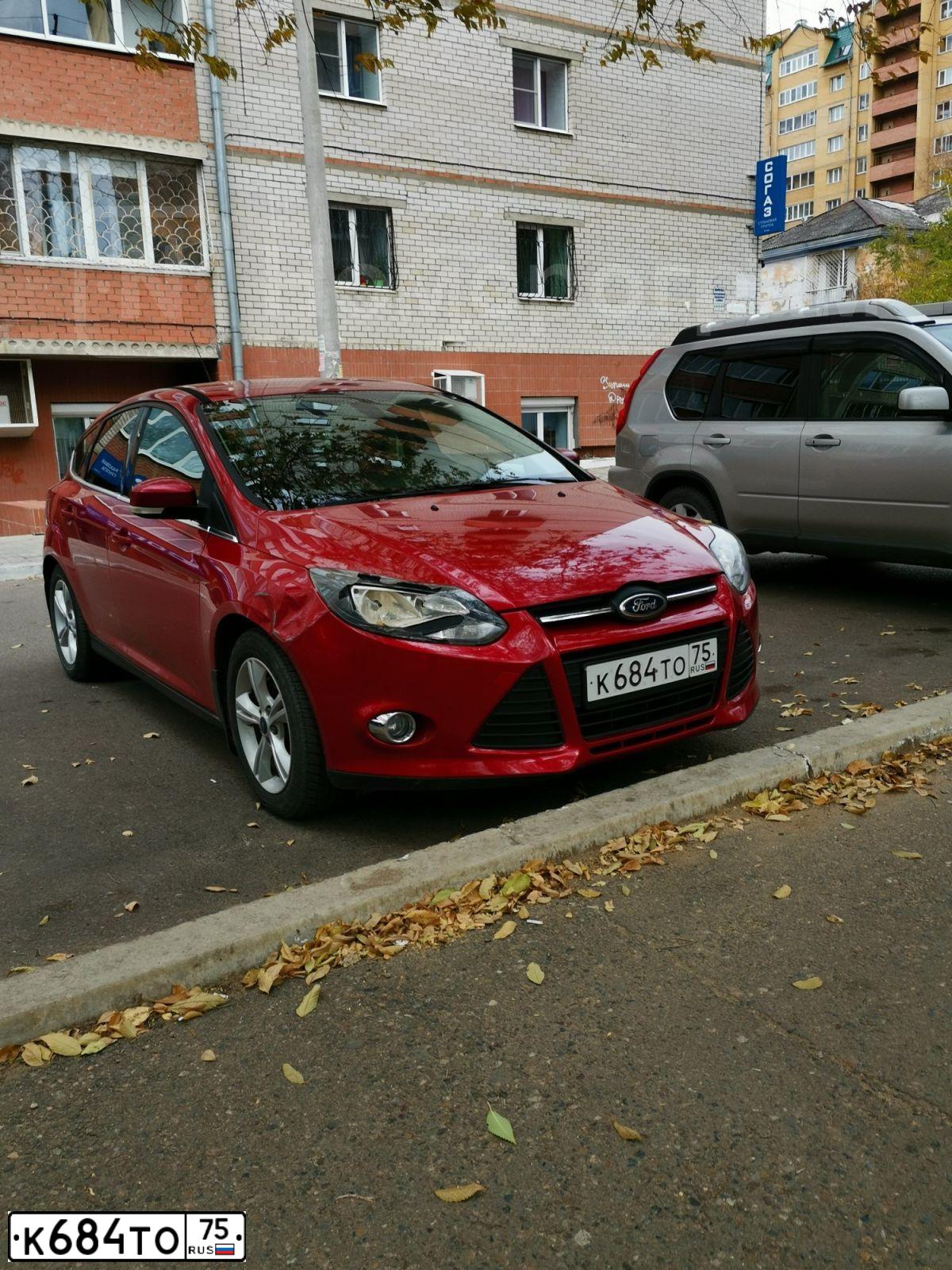 Фото автомобиля FORD FOCUS, 2012 — госномер К684ТО75. Цвет: Красный