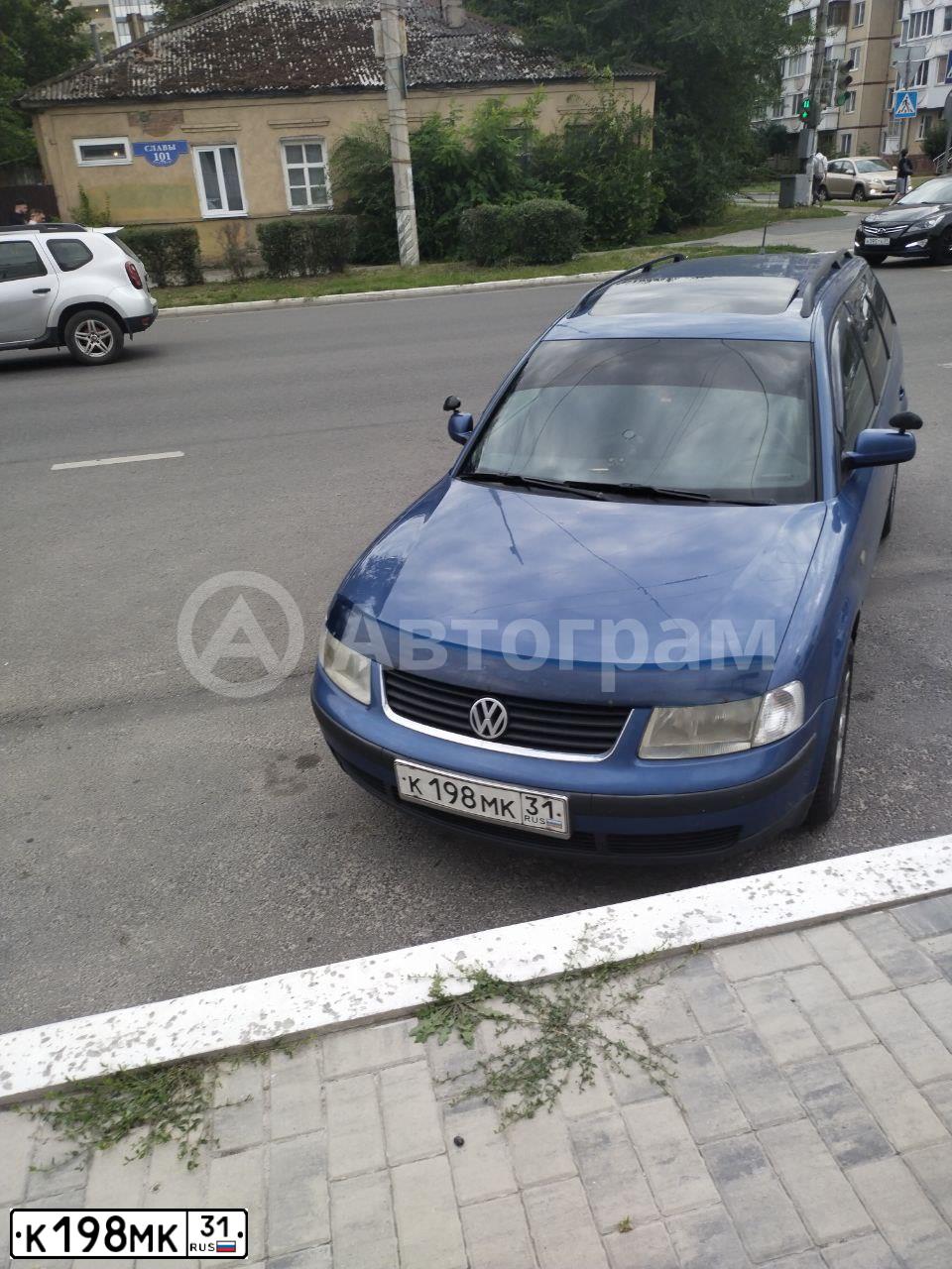Фото автомобиля VOLKSWAGEN PASSAT, 1998 — госномер К198МК31. Цвет: СИНИЙ