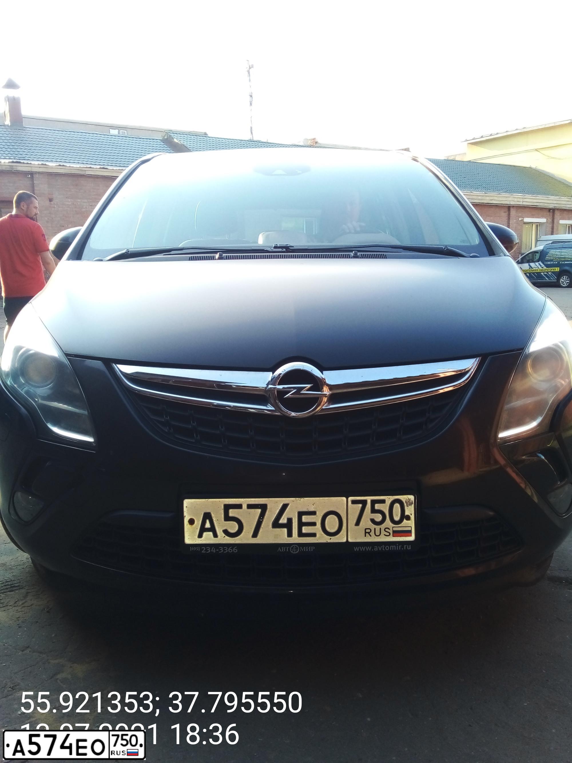 Фото автомобиля OPEL ZAFIRA, 2014 — госномер А574ЕО750. Цвет: КОРИЧНЕВЫЙ