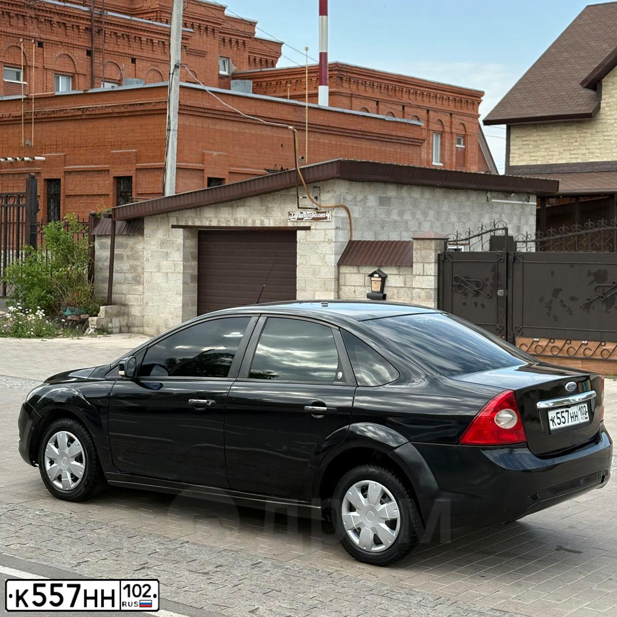 Фото автомобиля FORD FOCUS, 2008 — госномер К557НН102. Цвет: ЧЕРНЫЙ