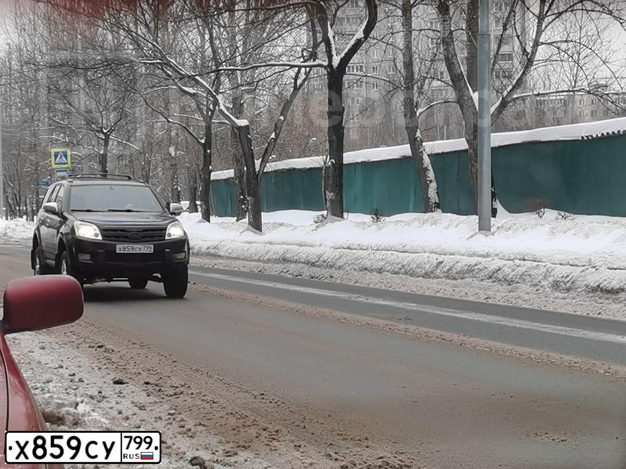 Фото автомобиля GREAT WALL HOVER, 2009 — госномер Е580РУ190. Цвет: ЧЕРНЫЙ