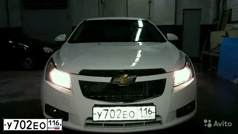 Фото автомобиля CHEVROLET CRUZE, 2010 — госномер Е854СВ134. Цвет: Белый