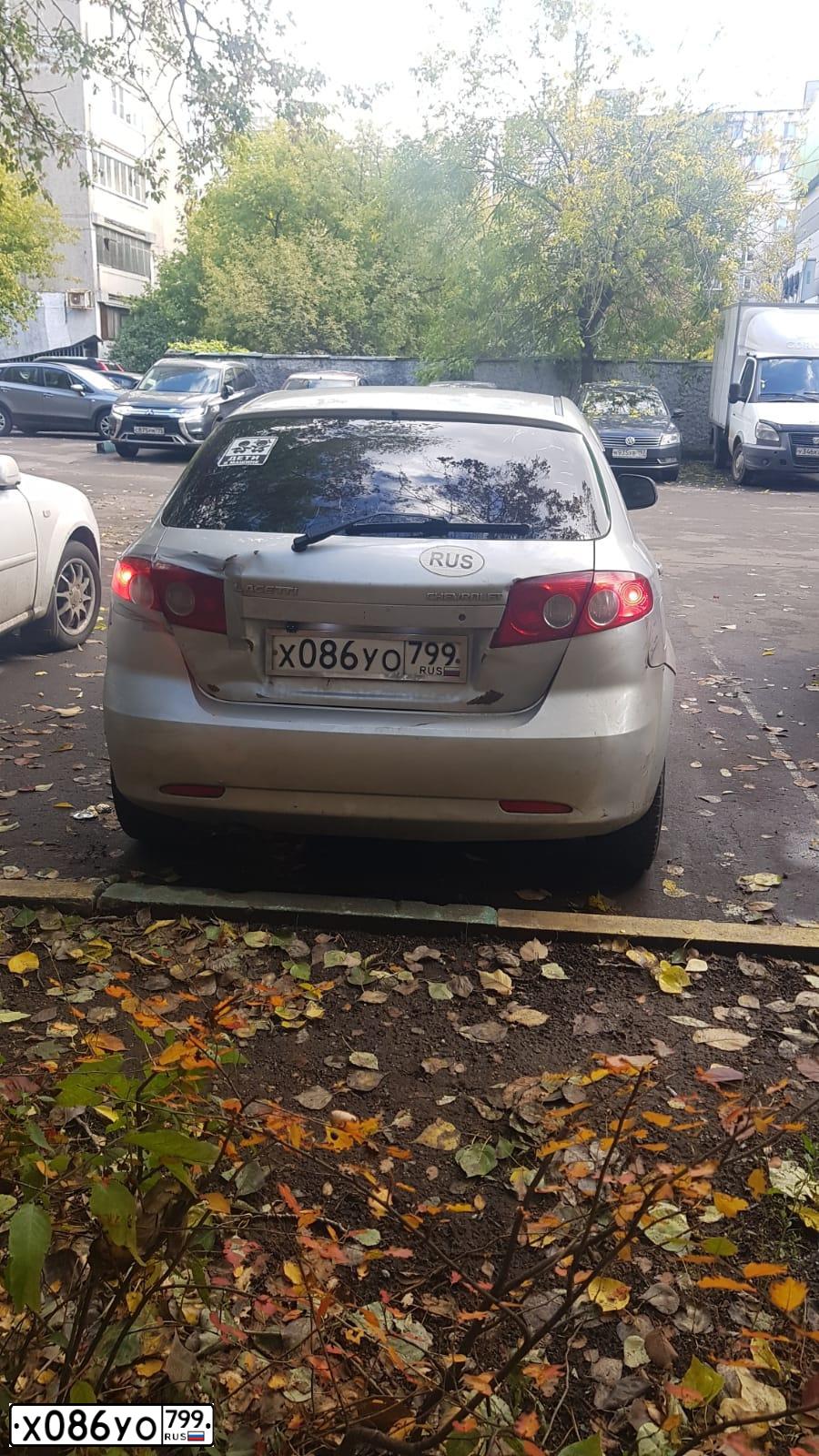 Фото автомобиля CHEVROLET LACETTI, 2008 — госномер Х086УО799. Цвет: СЕРЫЙ