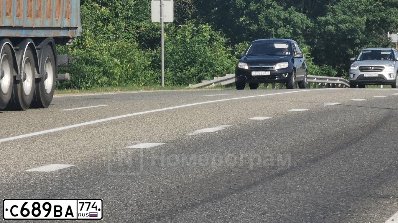 Фото автомобиля LADA 2190 GRANTA, 2012 — госномер Р193ОЕ716. Цвет: Сине-Черный