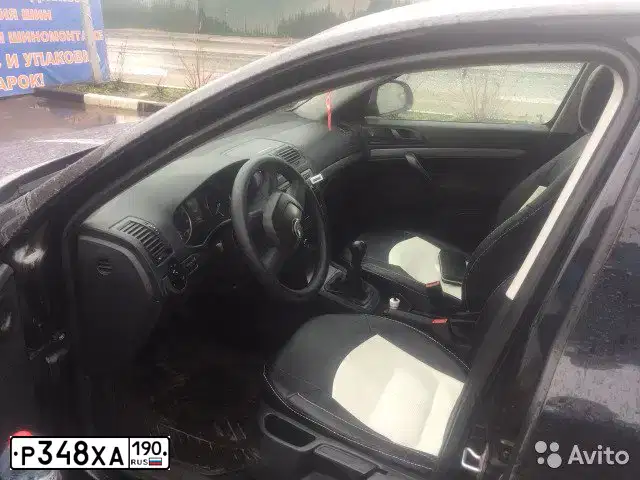 Фото автомобиля SKODA OCTAVIA, 2012 — госномер Е923ВТ156. Цвет: ЧЕРНЫЙ