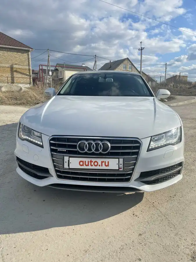 Фото автомобиля AUDI A7, 2013 — госномер М182НМ193. Цвет: Белый