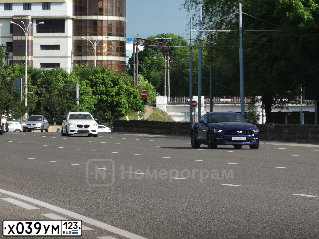 Фото автомобиля KIA SPORTAGE, 2012 — госномер Х039УМ123. Цвет: Белый