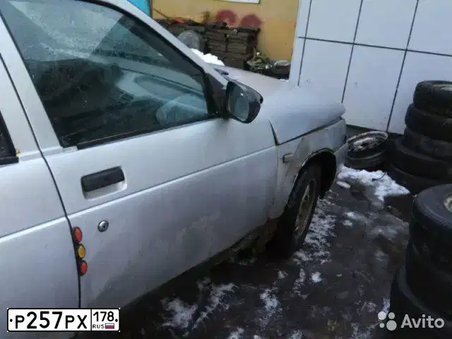 Фото автомобиля LADA 2110, 2002 — госномер Р257РХ178. Цвет: Серебристый