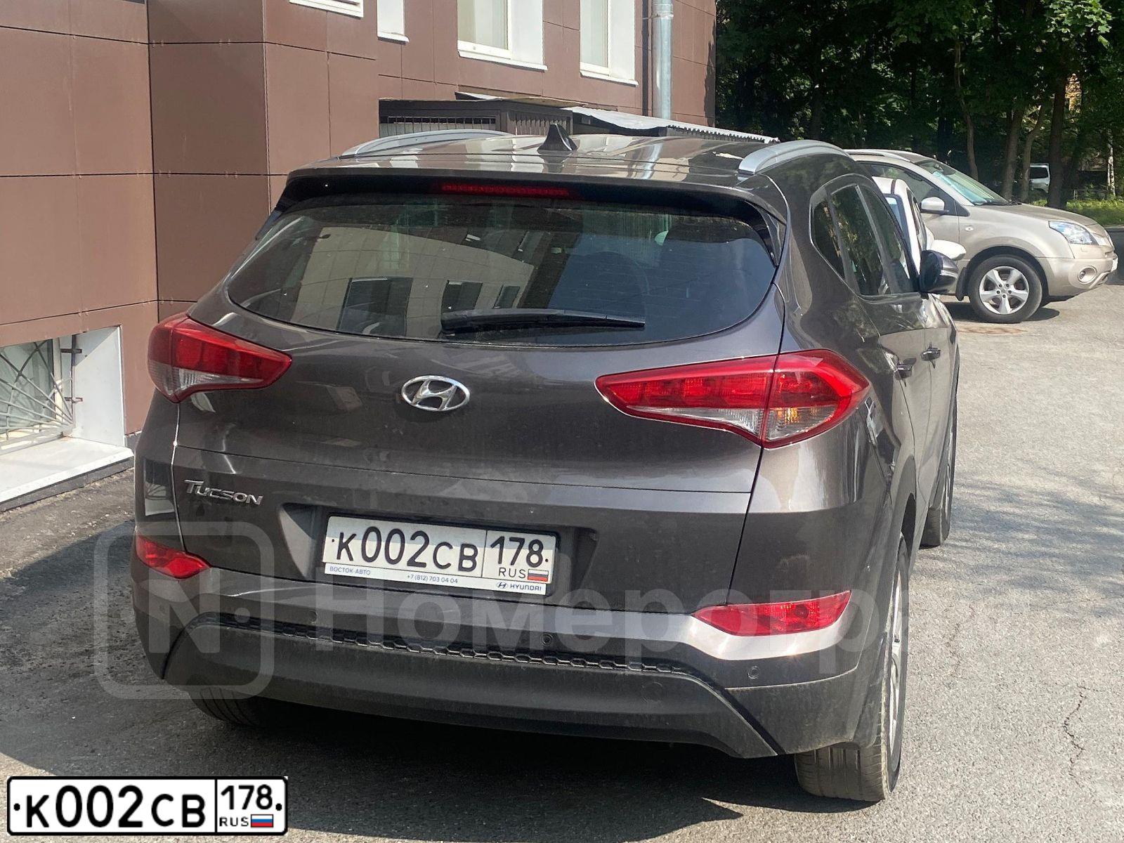 Фото автомобиля HYUNDAI IX35, 2011 — госномер К002СВ178. Цвет: ЧЕРНЫЙ