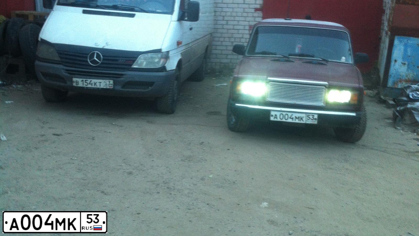 Фото автомобиля LADA 2107, 2004 — госномер А004МК53. Цвет: ТЕМНО-БОРДОВЫЙ
