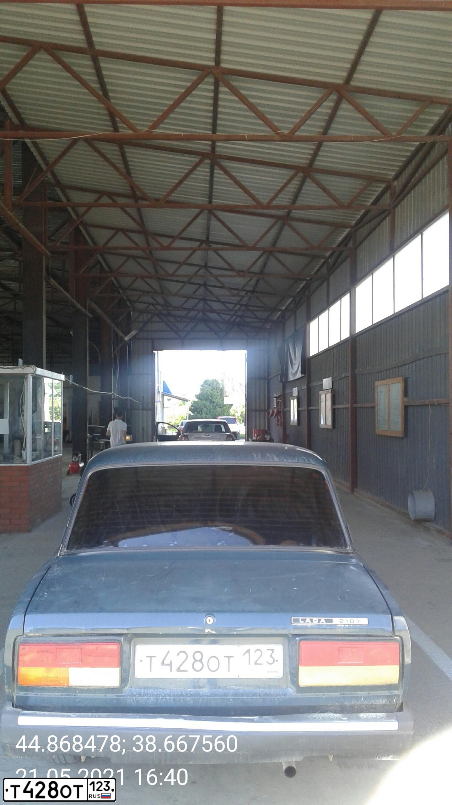 Фото автомобиля LADA 2107, 2006 — госномер Т428ОТ123. Цвет: Темно-зеленый