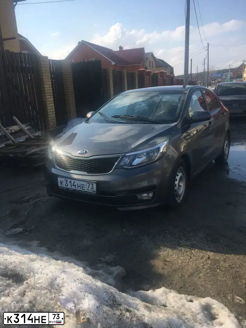 Фото автомобиля KIA RIO, 2016 — госномер К314НЕ73. Цвет: ТЕМНО-СЕРЫЙ