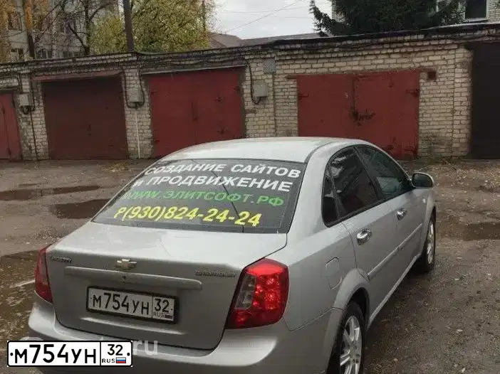 Фото автомобиля CHEVROLET LACETTI, 2006 — госномер М754УН32. Цвет: СЕРЕБРИСТЫЙ