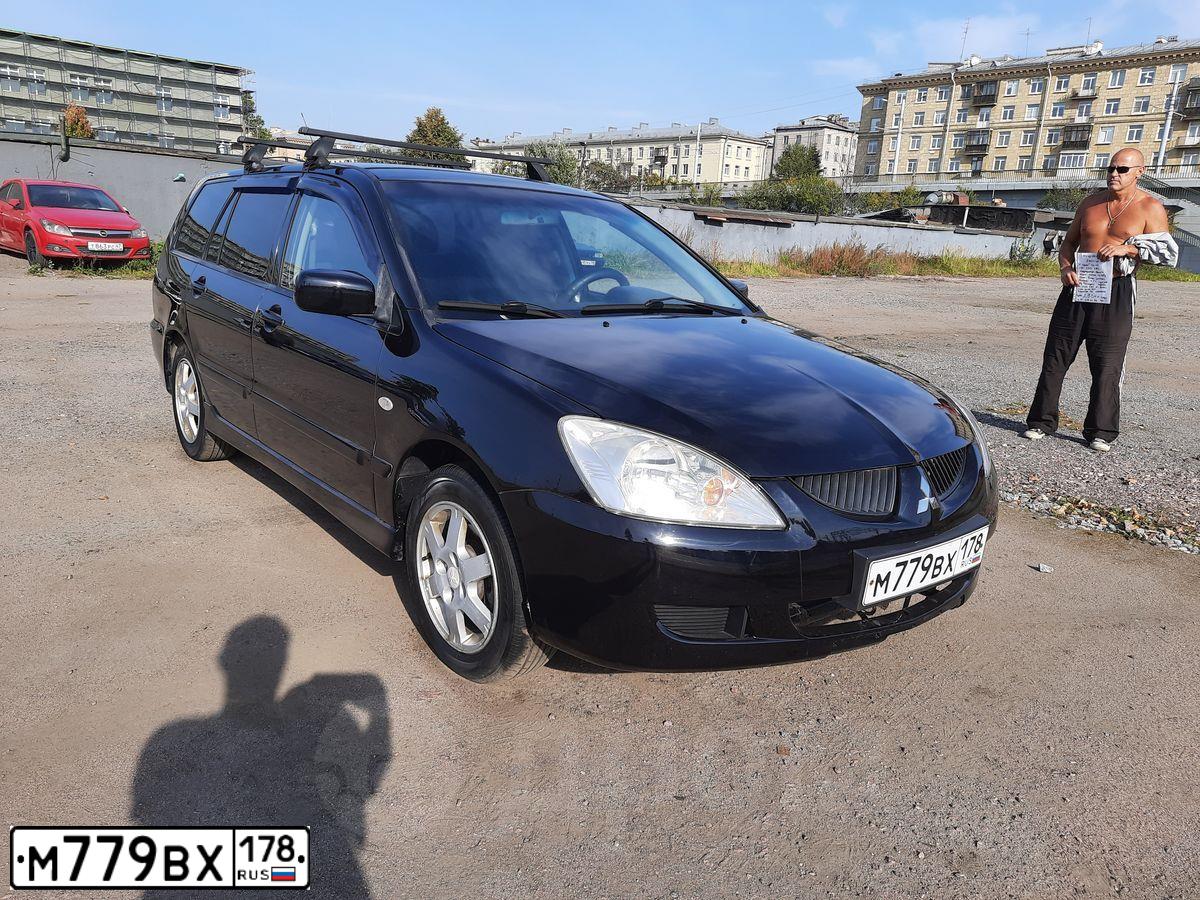 Фото автомобиля MITSUBISHI LANCER, 2006 — госномер В978ММ147. Цвет: ЧЕРНЫЙ