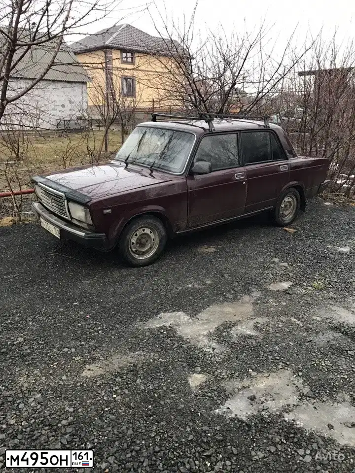 Фото автомобиля LADA 2107, 2005 — госномер К212СМ33. Цвет: ТЕМНО-ВИШНЕВЫЙ