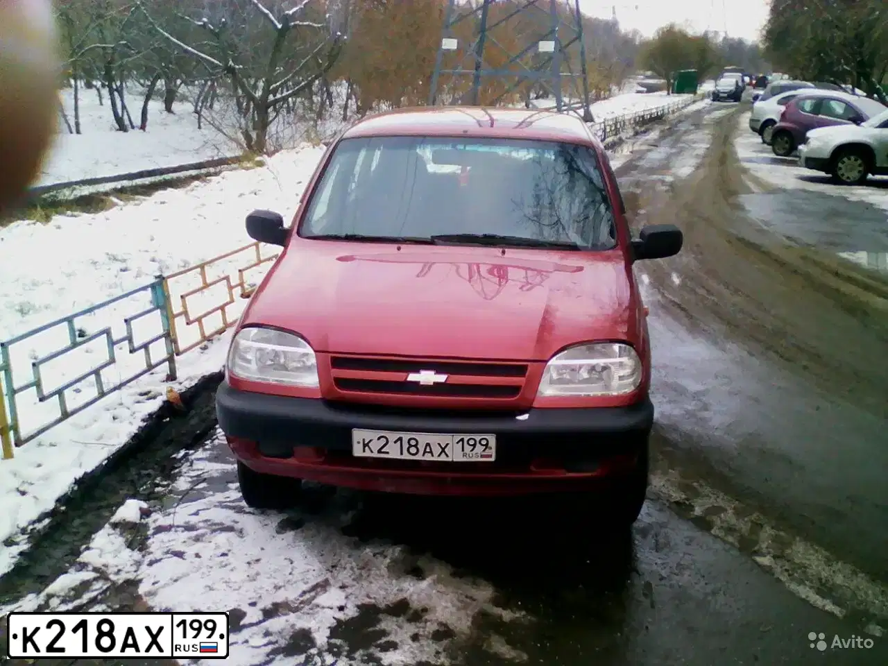 Фото автомобиля CHEVROLET NIVA, 2008 — госномер А184МН790. Цвет: Ярко-красный металлик