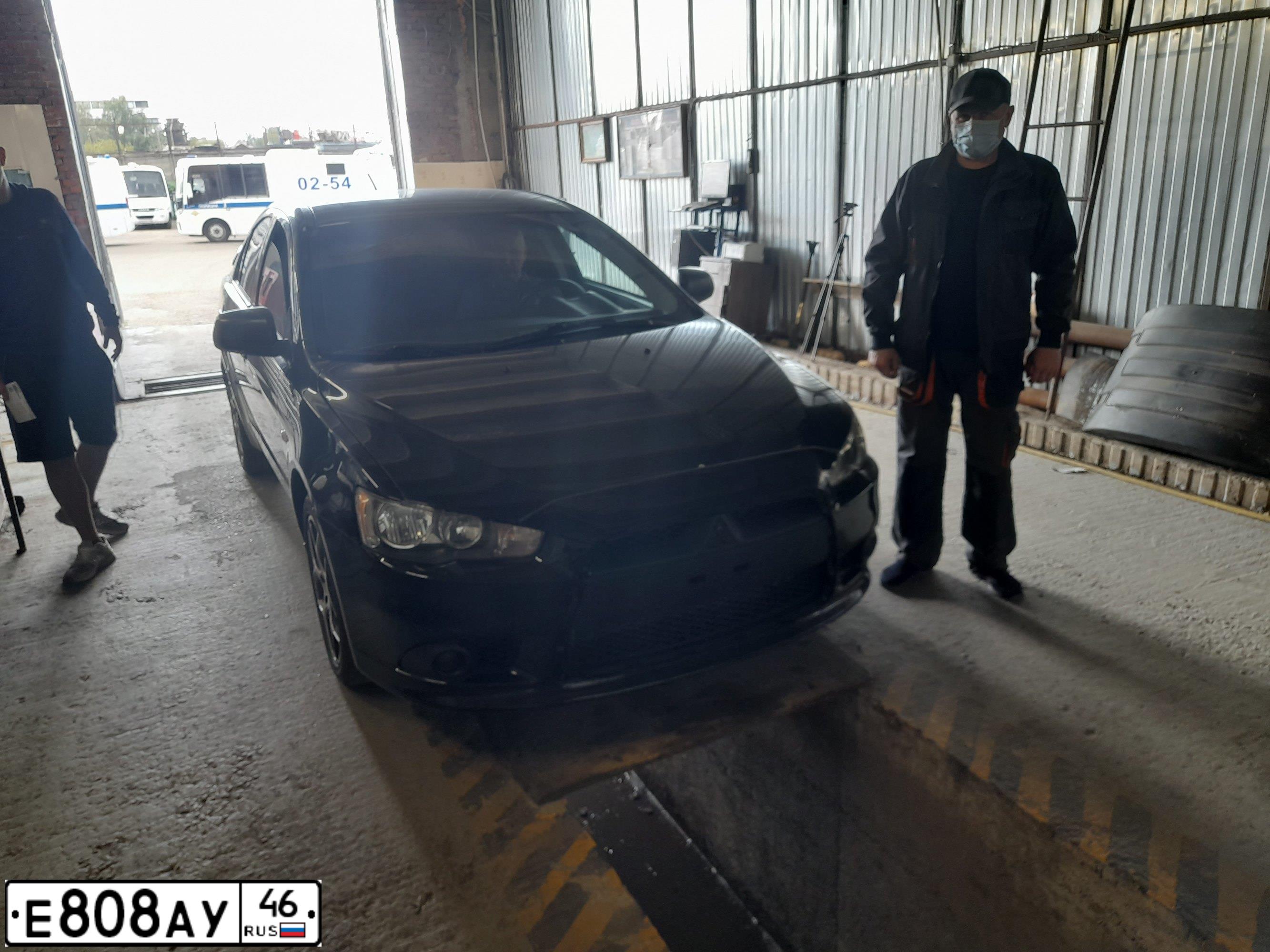 Фото автомобиля MITSUBISHI LANCER, 2011 — госномер Е808АУ46. Цвет: ЧЕРНЫЙ