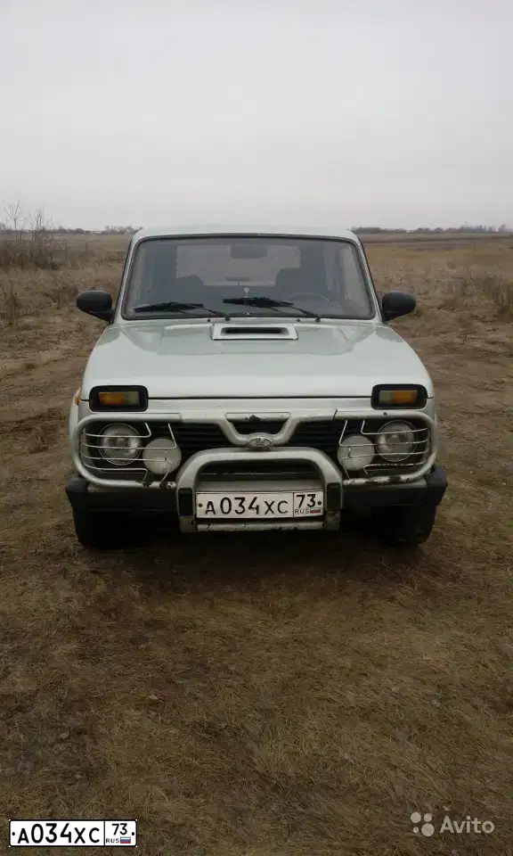 Фото автомобиля LADA 2121 NIVA, 2001 — госномер А034ХС73. Цвет: СВЕТЛО-ЗЕЛЕНЫЙ