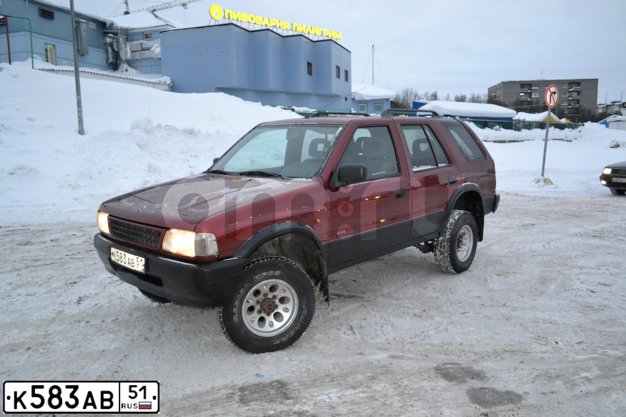 Фото автомобиля OPEL FRONTERA, 1994 — госномер Т648ЕУ51. Цвет: ВИШНЕВЫЙ