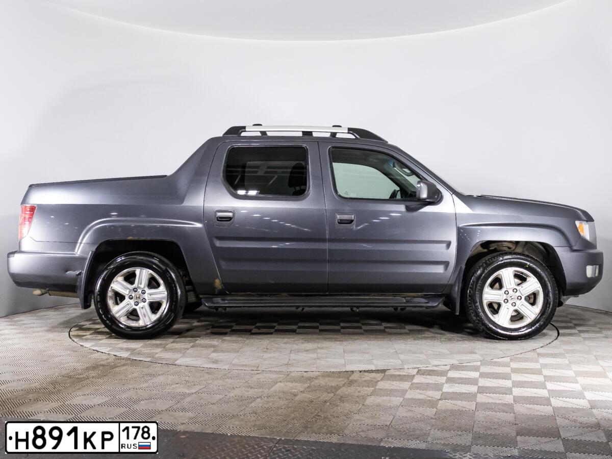 Фото автомобиля HONDA RIDGELINE, 2010 — госномер О026СК797. Цвет: СЕРЫЙ