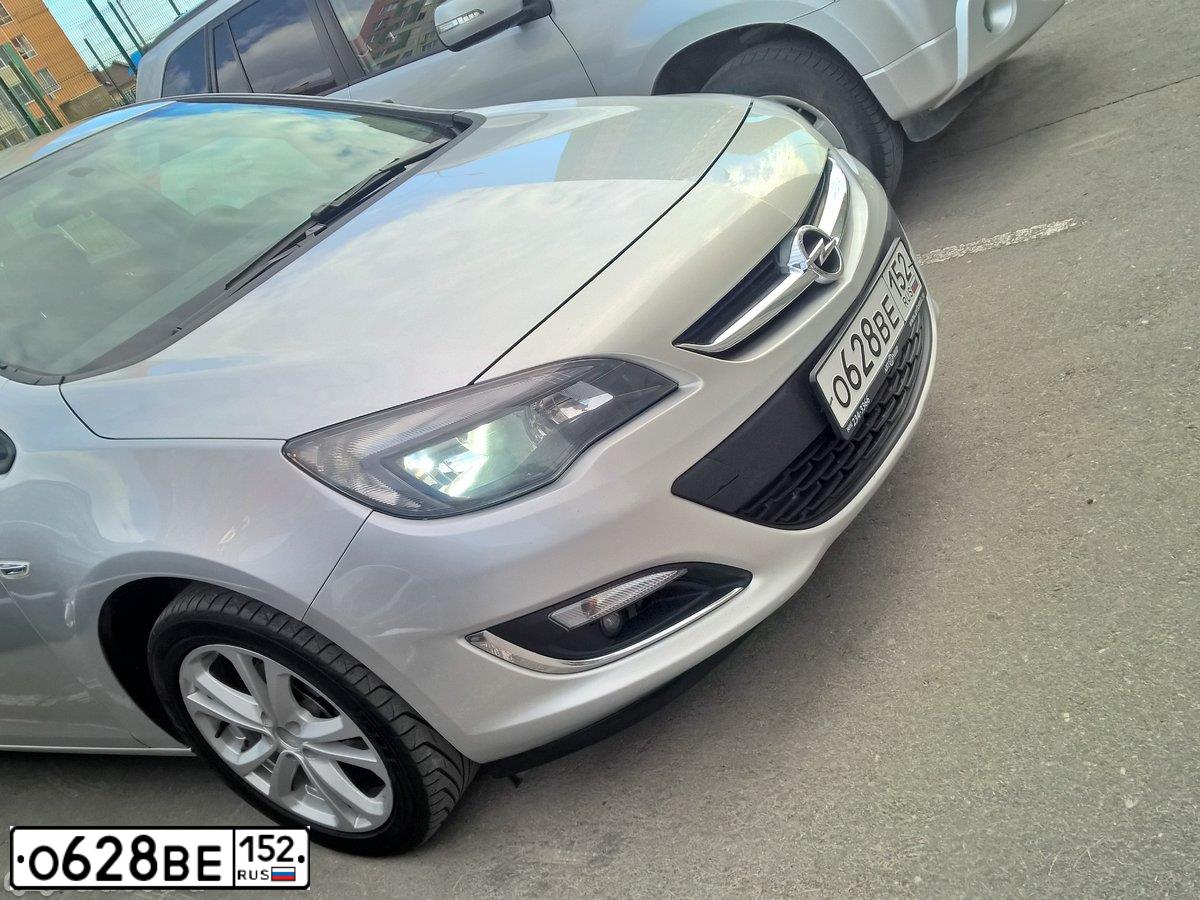 Фото автомобиля OPEL ASTRA, 2012 — госномер С812ТО152. Цвет: СВЕТЛО СЕРЫЙ
