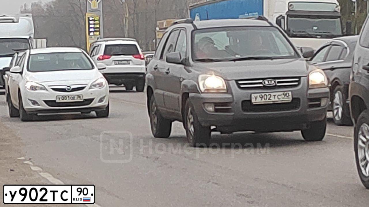 Фото автомобиля KIA SPORTAGE, 2005 — госномер Е516НС863. Цвет: ТЕМНО-СЕРЫЙ