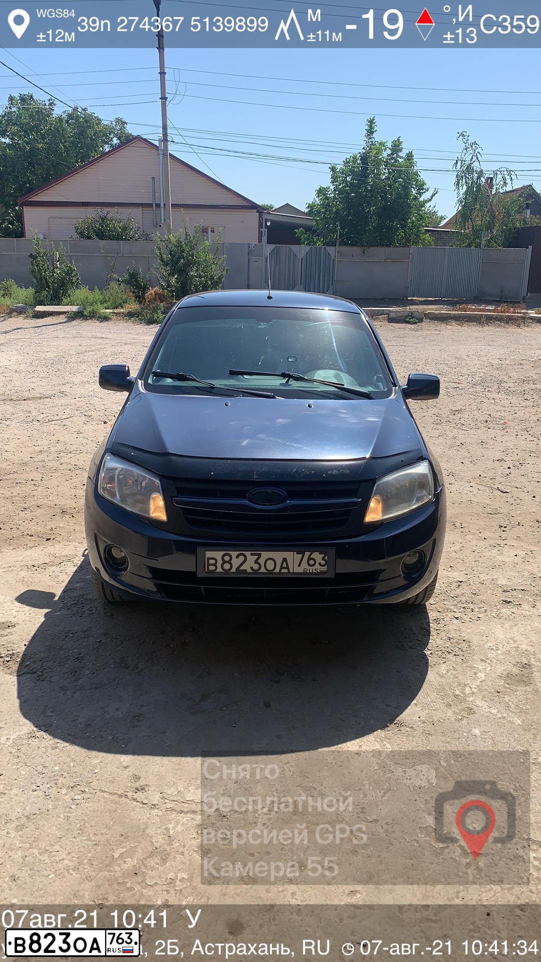 Фото автомобиля LADA 2190 GRANTA, 2013 — госномер Е705НК30. Цвет: СЕРО СИНИЙ