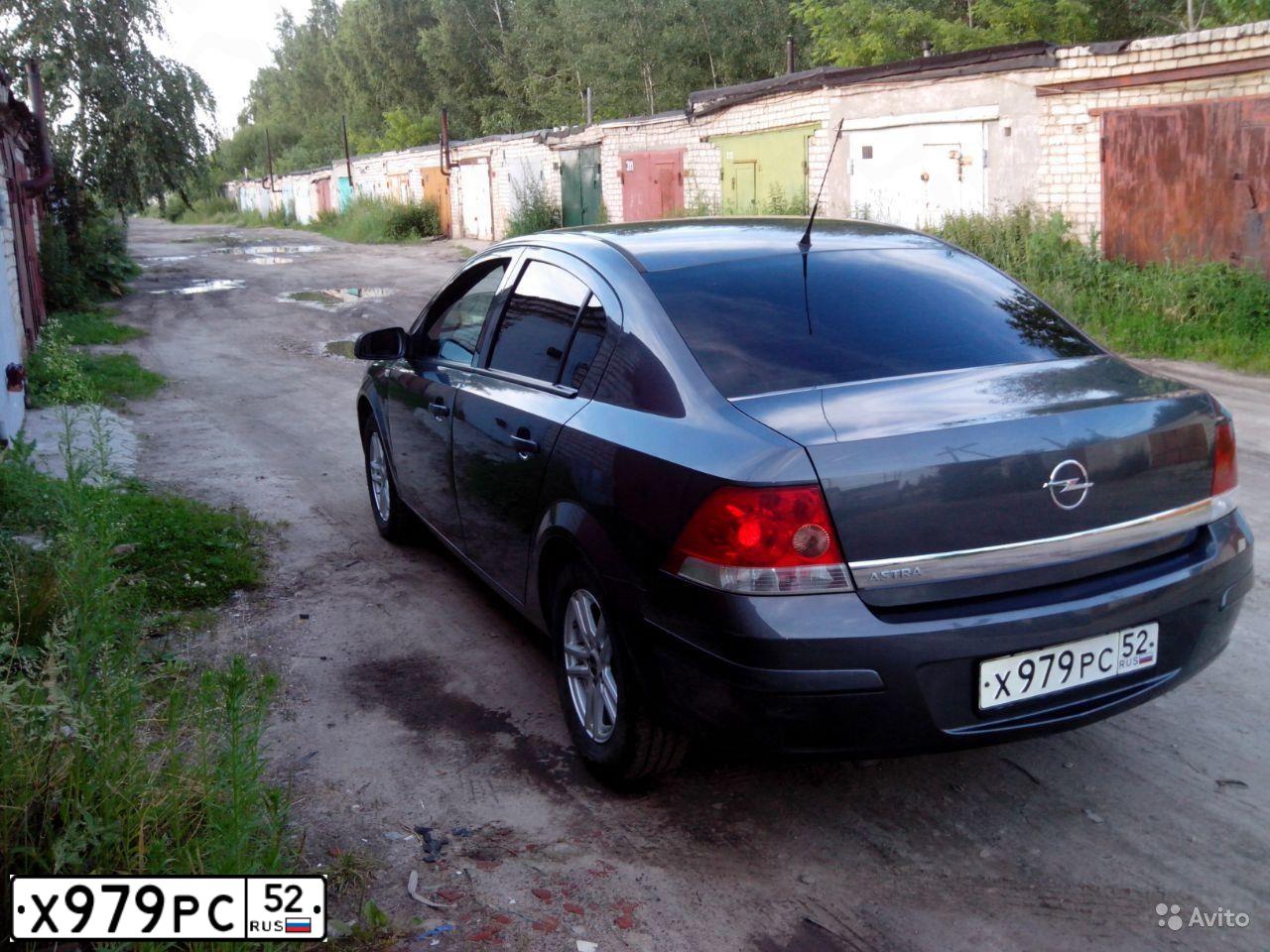 Фото автомобиля OPEL ASTRA, 2008 — госномер Х979РС52. Цвет: Серый
