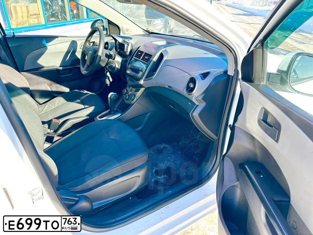 Фото автомобиля CHEVROLET AVEO, 2012 — госномер Е699ТО763. Цвет: Белый