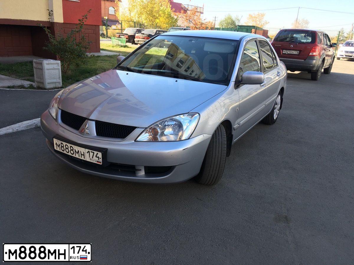 Фото автомобиля MITSUBISHI LANCER, 2007 — госномер М119ВН774. Цвет: Серебристый