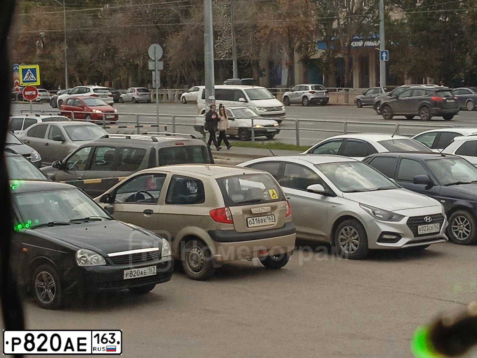 Фото автомобиля LADA 2172 PRIORA, 2009 — госномер Р820АЕ163. Цвет: ТЕМНО-ЗЕЛЕНЫЙ