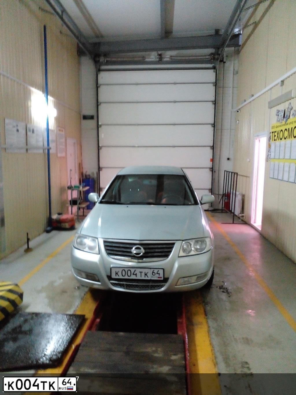 Фото автомобиля NISSAN ALMERA, 2006 — госномер К004ТК64. Цвет: Серебристый