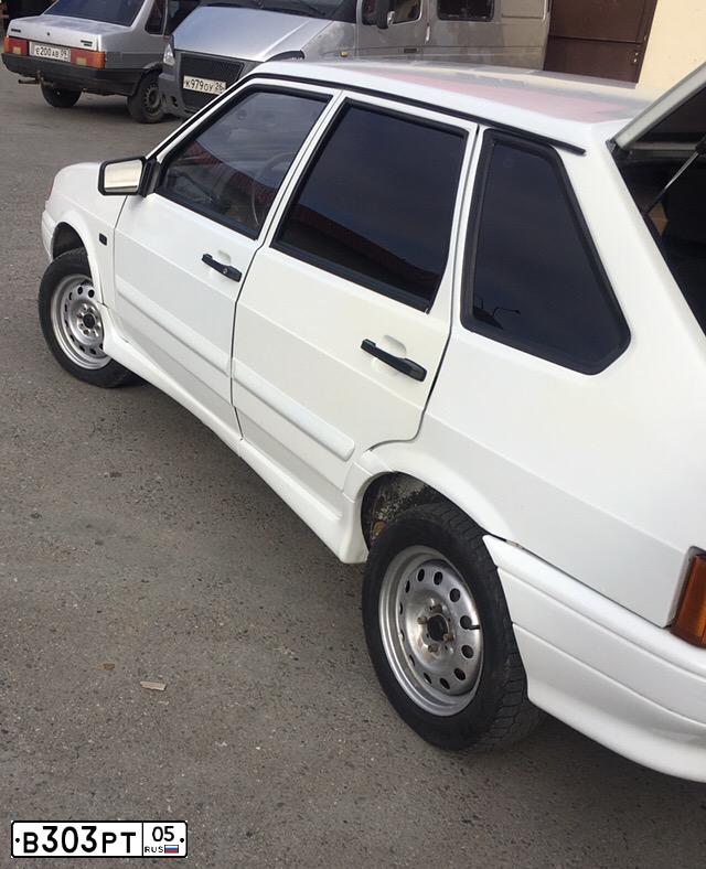 Фото автомобиля LADA 2114 SAMARA, 2004 — госномер В303РТ05. Цвет: ТЕМНО-МАЛИНОВЫЙ