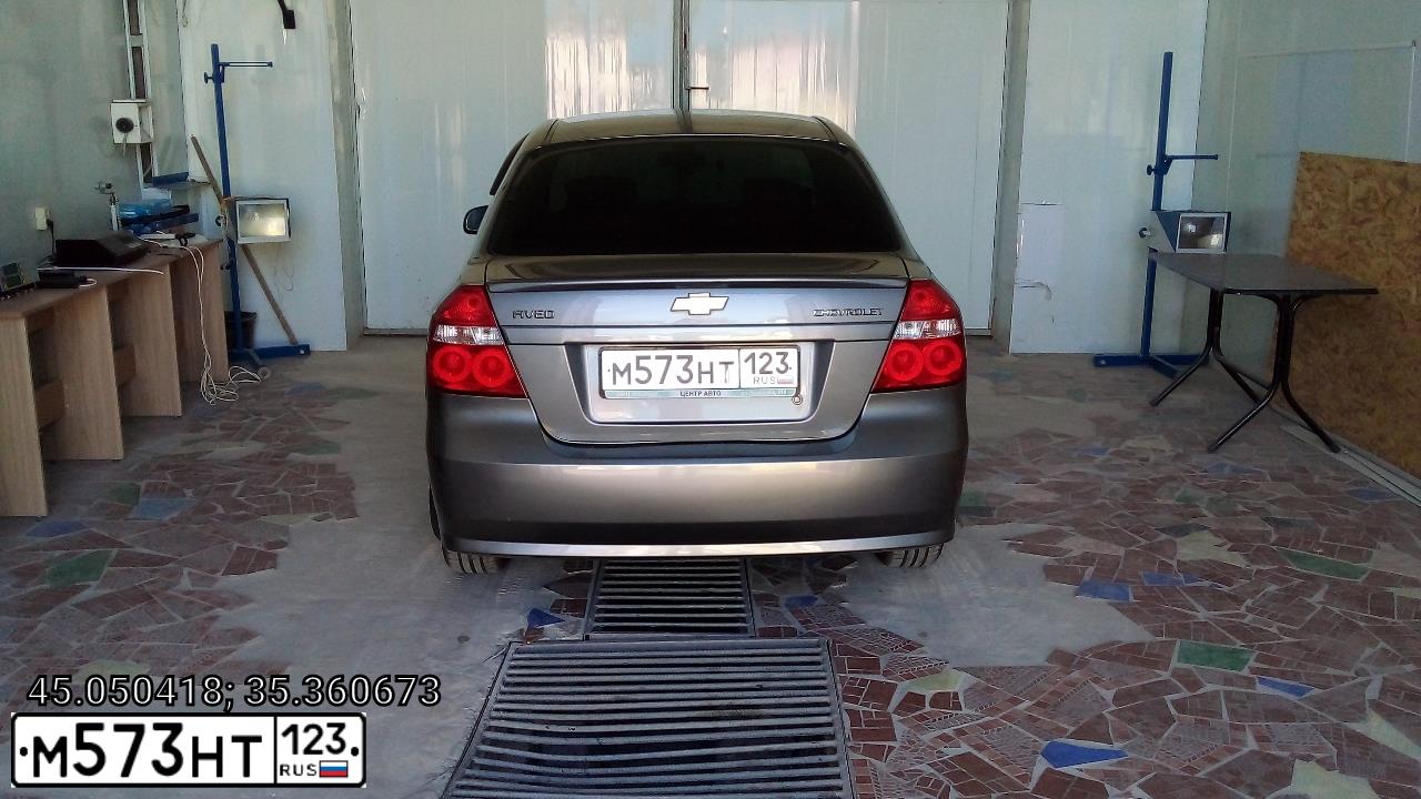 Фото автомобиля CHEVROLET AVEO, 2010 — госномер М573НТ123. Цвет: СЕРЫЙ