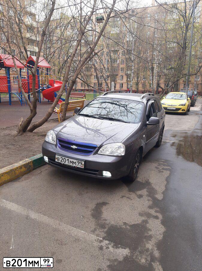 Фото автомобиля CHEVROLET LACETTI, 2012 — госномер В201ММ99. Цвет: ЧЕРНЫЙ