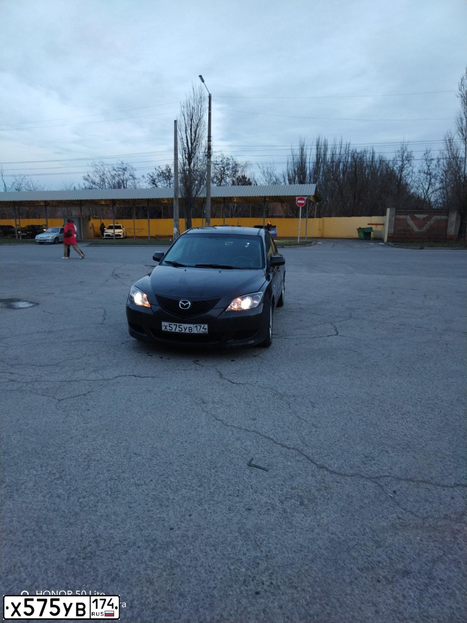 Фото автомобиля MAZDA 3, 2005 — госномер Х575УВ174. Цвет: ЧЕРНЫЙ
