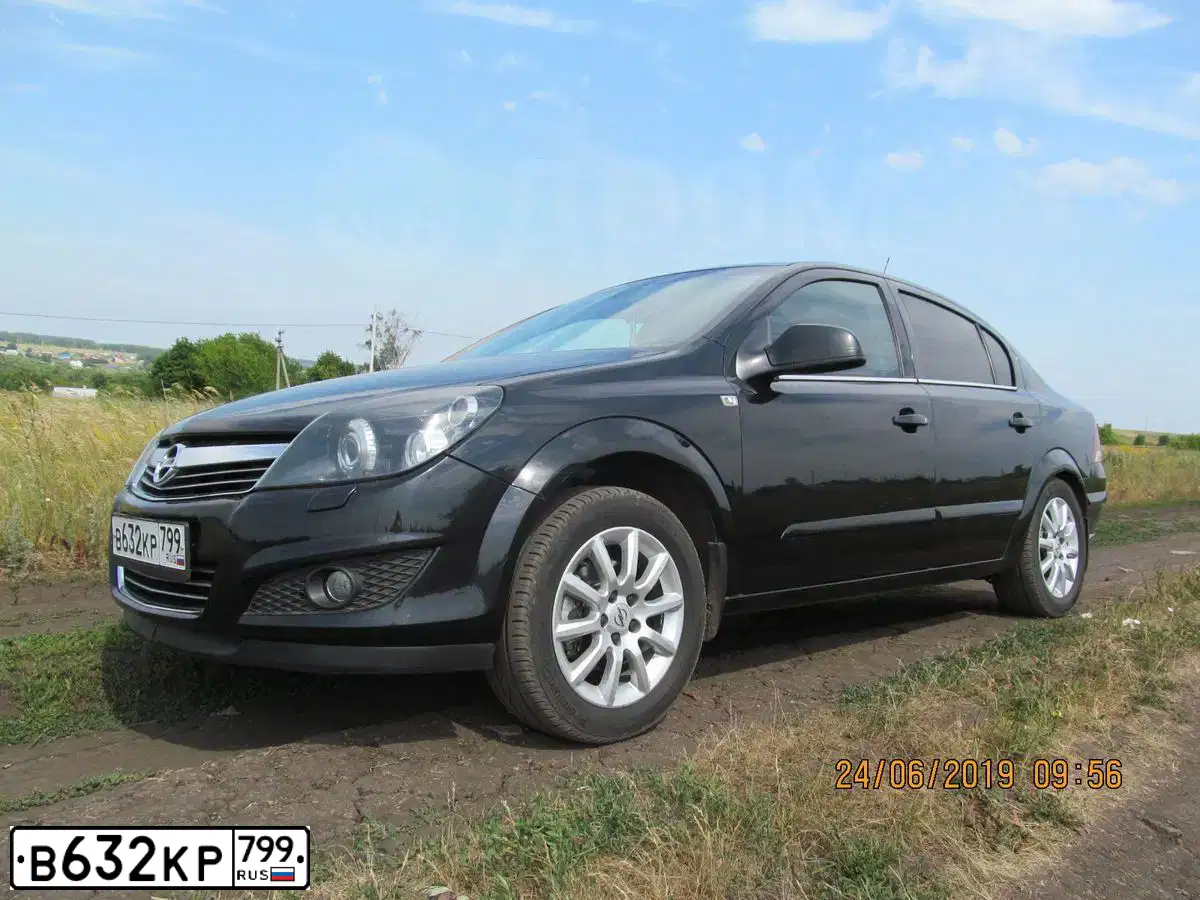 Фото автомобиля OPEL ASTRA, 2012 — госномер В632КР799. Цвет: ЧЕРНЫЙ