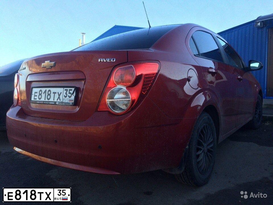 Фото автомобиля CHEVROLET T AVEO, 2012 — госномер Е818ТХ35. Цвет: Красный