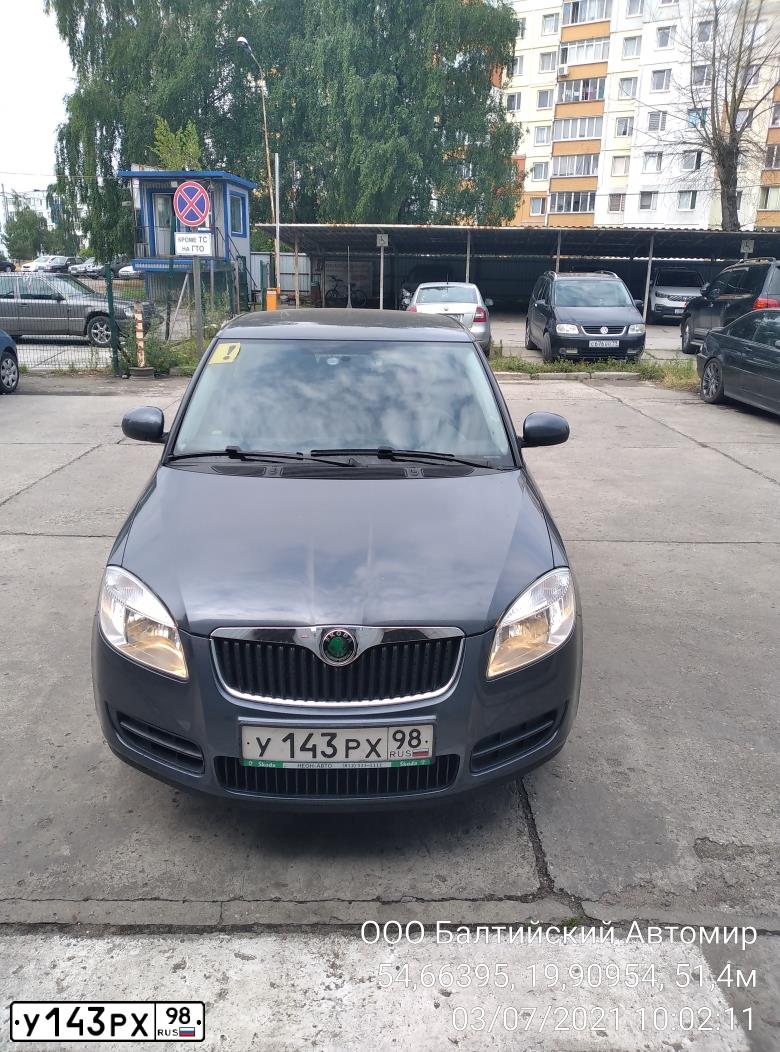 Фото автомобиля FORD FOCUS, 2010 — госномер С931ММ178. Цвет: Красно-оранжевый