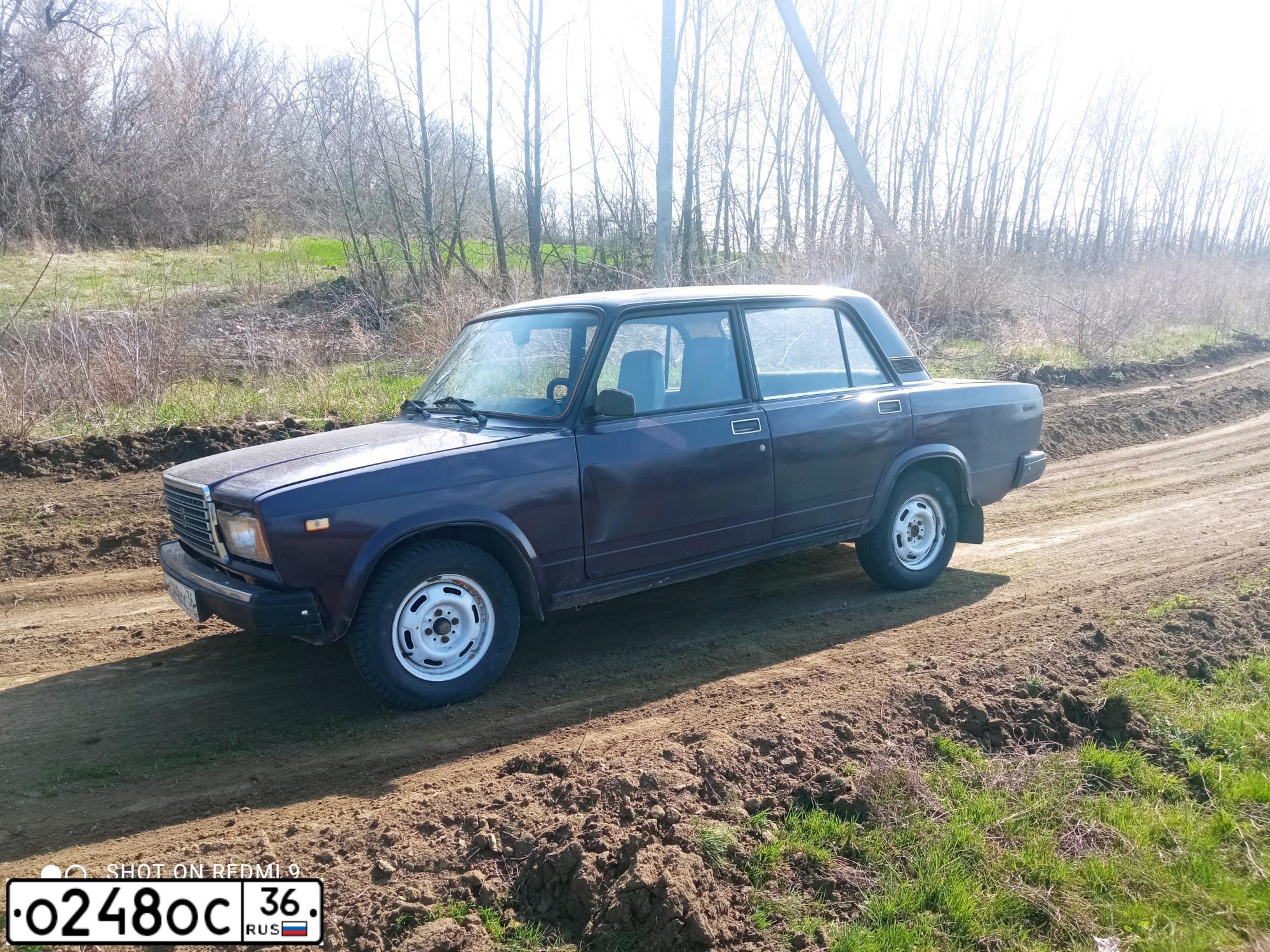 Фото автомобиля LADA 2107, 2000 — госномер О248ОС36. Цвет: ФИОЛЕТОВЫЙ