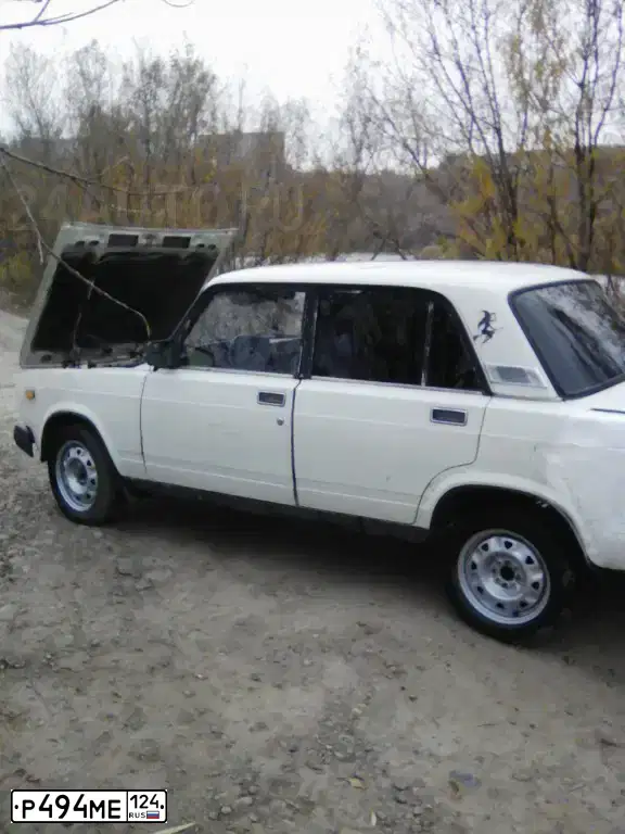 Фото автомобиля LADA 2107, 1995 — госномер Р494МЕ124. Цвет: БЕЛЫЙ