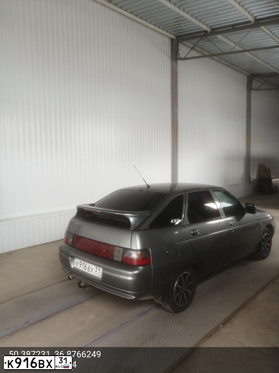 Фото автомобиля LADA 2112 LADA, 2007 — госномер К916ВХ31. Цвет: СРЕДНИЙ СЕРО-ЗЕЛЕНЫЙ МЕТ