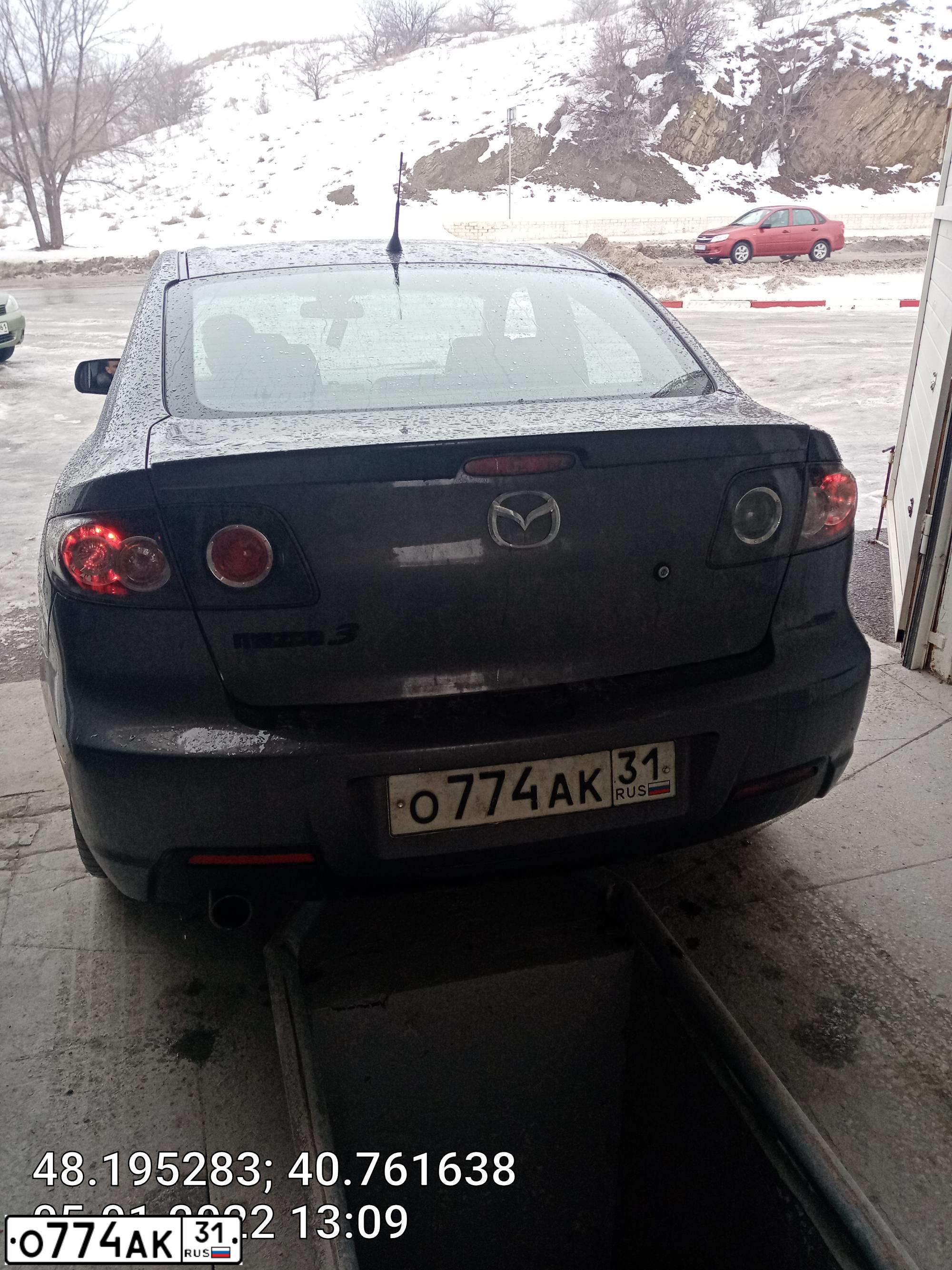Фото автомобиля MAZDA 3, 2006 — госномер О774АК31. Цвет: СЕРЫЙ
